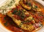 Tilapia fillets served in roasted red pepper sauce with herbs.