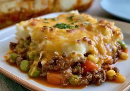 Easy hobo casserole with ground beef, sliced potatoes, melted cheese, and a creamy sauce baked until golden and bubbly.