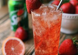 Refreshing strawberry dirty sprite drink with ice and fizzy bubbles.