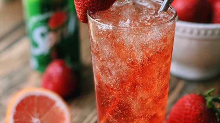 Refreshing strawberry dirty sprite drink with ice and fizzy bubbles.