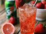Refreshing strawberry dirty sprite drink with ice and fizzy bubbles.
