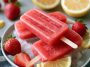 Strawberry lemonade popsicles – Bright pink frozen pops made with fresh strawberries and lemonade.
