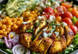 High protein chicken salad with Greek yogurt dressing – A bowl of shredded chicken, crisp vegetables, and creamy Greek yogurt dressing.