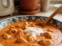“Authentic butter chicken with rice butter chicken recipeand herbs”