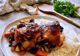 Juicy honey garlic chicken thighs coated in a sticky sweet garlic sauce and garnished with fresh parsley.