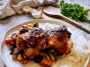Juicy honey garlic chicken thighs coated in a sticky sweet garlic sauce and garnished with fresh parsley.
