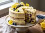 Delicious lemon blueberry cake – Moist lemon cake topped with fresh blueberries and glaze.