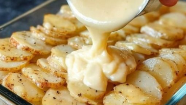 Creamy Parmesan Pepper Dressing creamy potato bakeRecipe served in a small bowl with fresh salad ingredients and cracked black pepper.