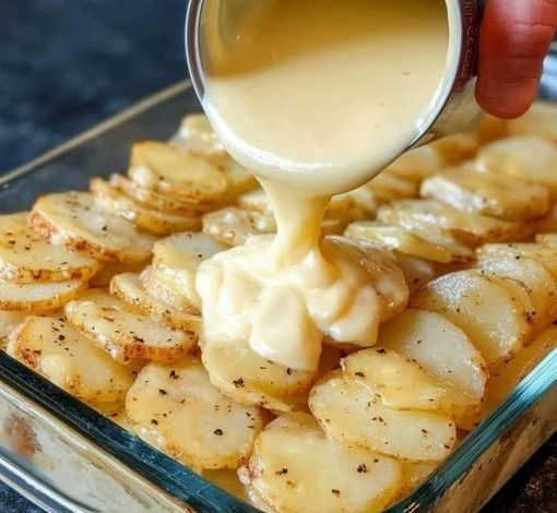 Creamy Parmesan Pepper Dressing creamy potato bakeRecipe served in a small bowl with fresh salad ingredients and cracked black pepper.
